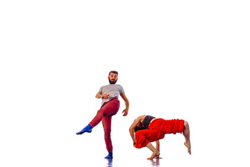 Pair of dancers isolated on the white wall