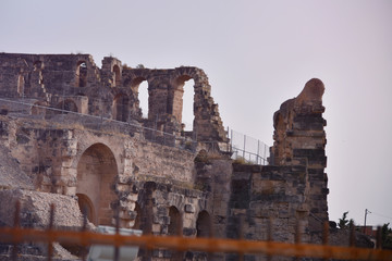 Fototapeta premium The ruins of ancient roman amphitheater in El-Jem. The largest colosseum in North Africa. Mahdia governorate, Tunisia.