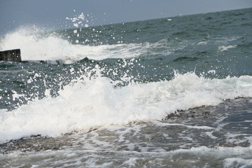 storm, big waves on the coast, splashes of salt water