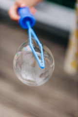 Blowing Bubbles with Wand