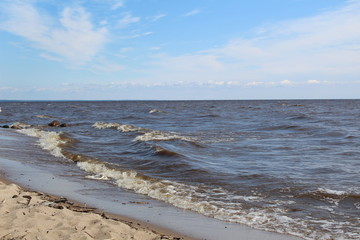 picturesque, large lake with waves for summer holidays 