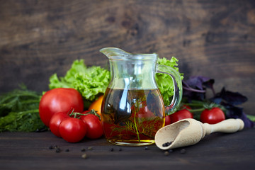 Composition with vegetables and spices on a table on a dark background