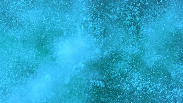 Super slow motion of blue powder explosion. Filmed on high speed cinema camera, 1000fps.