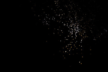 Gold abstract bokeh. Black background. Holyday concept