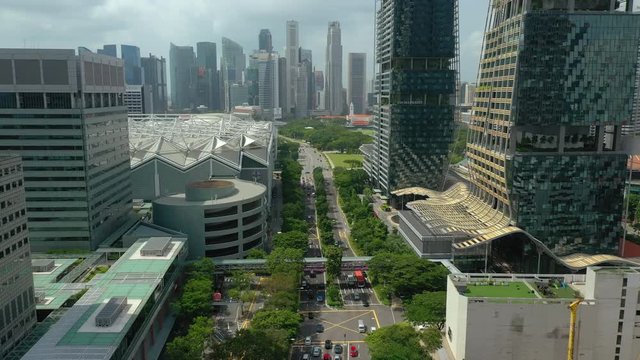 singapore city sunny day famous downtown buildings traffic street aerial panorama 4k 
