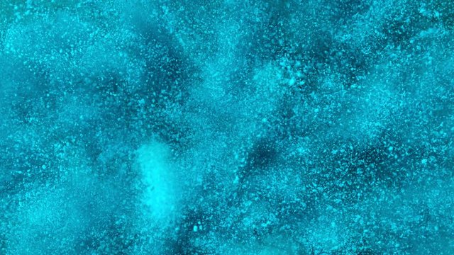 Super slow motion of blue powder explosion. Filmed on high speed cinema camera, 1000fps.
