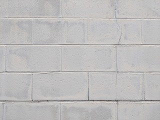 Cinderblock wall painted white background or texture element.