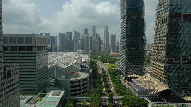 singapore city sunny day famous downtown buildings traffic street aerial panorama 4k 