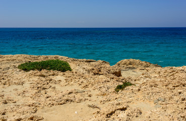 Fototapeta na wymiar amazing blue sea and cliffs off the coast of cyprus