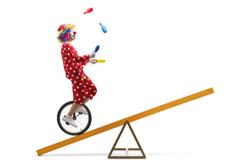 Clown riding a unicycle on a beam and juggling