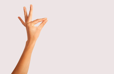 Multiple female caucasian hand gestures isolated over the white background, set of multiple images