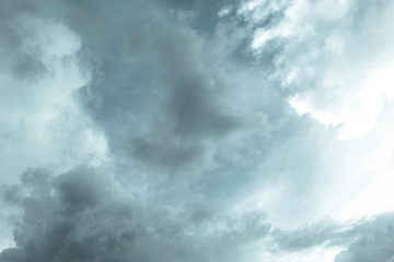 The backdrop of the sky with rain clouds.