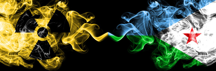 Djibouti vs nuclear smoky mystic flags placed side by side. Thick colored silky smokes combination of Djibouti flag and radioactive sign.