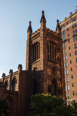 Fototapeta na wymiar New York, NY / USA - May/27/2019: Church in the center of New York. Church on a background of blue sky.