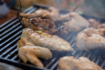 Preparing meat on the grill. Gourmet barbecue, tasty food