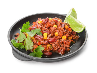 Frying pan with tasty chili con carne on white background