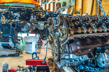 v8 engine from car being rebuilt in garage