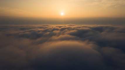 Watching the sunrise and sunset from the clouds