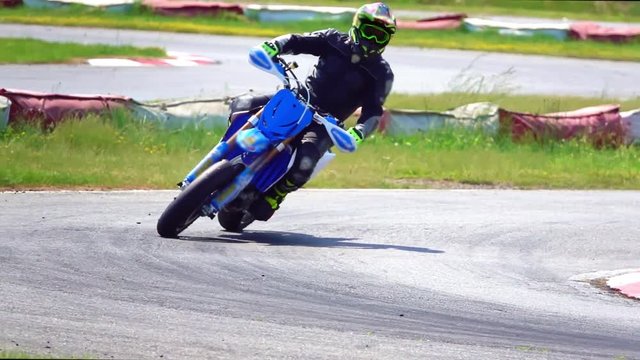 Motorcycle cornering on racing circuit
