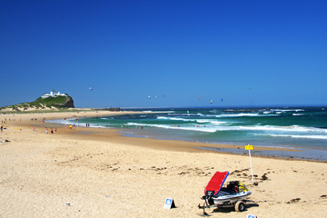 Fototapeta na wymiar view across the beach to Nobby's headland. Newcastle. Australia.