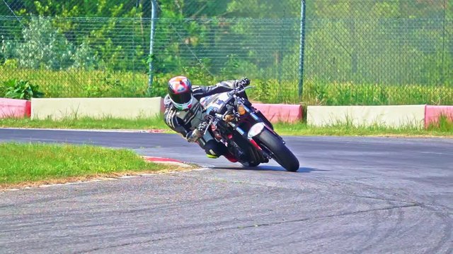 slow motion Motorcycle cornering on racing circuit