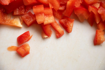 Cut Red Pepper Detail Summer vegetable fresh picked from the garden. Salad prep. Meal prep. Healthy fresh food. Red and Vibrant. Delicious and sweet.