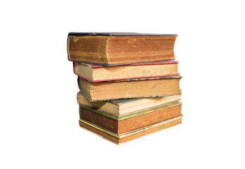 Old books stacked and isolated on white background.