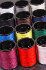 Colorful spools of thread. Accessories for needlework