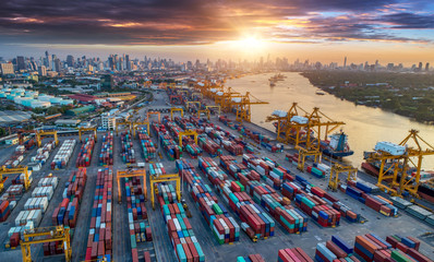 Logistics and transportation of Container Cargo ship and Cargo plane with working crane bridge in...