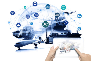 Hand holding tablet is pressing button on touch screen interface in front Logistics Industrial...