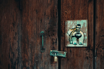 Old wooden door with Old keys and painted wooden.