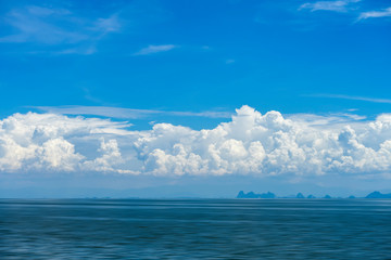 Obraz premium Blue sky background with white clouds.