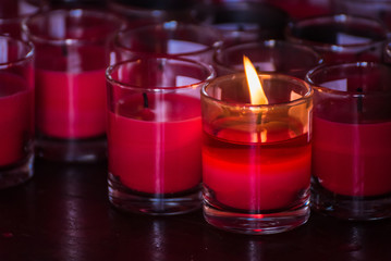 Festival of Lights. Beautiful candle light. Selective focus on foreground of many burning tealight candles.Bangkok, Thailand.