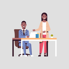 businessman with female assistant using laptop discussing new project during meeting at workplace teamwork concept african american couple working together flat full length