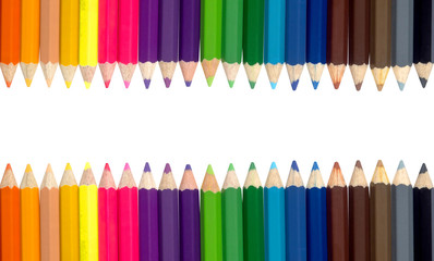 Close up of color pencils isolated on white background.