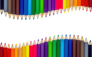 Color pencils wave on white background