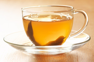 Fresh hot tea in glass cup cllose-up