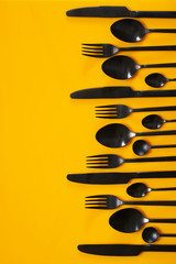 Set of black steel cutlery