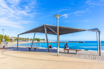 beach with chairs and umbrellas, Saint-Gilles, Réunion 