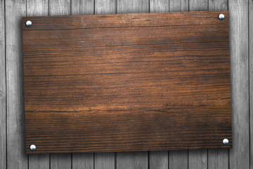 Wooden board with rivets