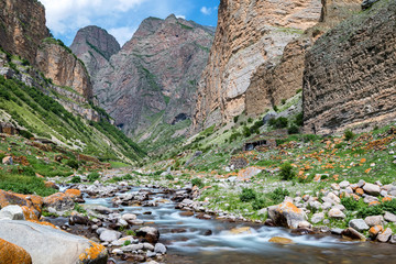 Beautiful peaceful view of water in mountain river. Slow shutter speed