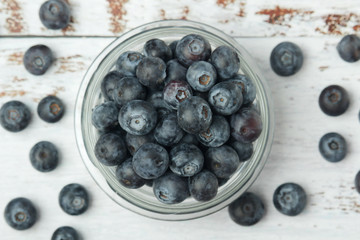 A glass bowl with blueberry