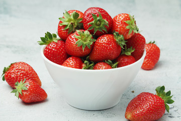 A bowl with ripe bright strawberry