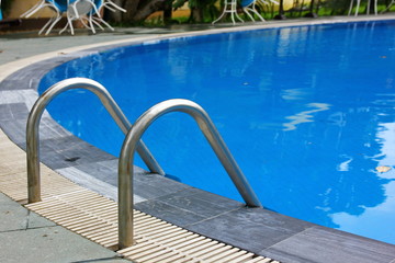 the swimming pool in resort , hotel or condominium