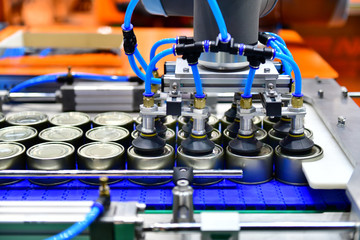 Aluminum cans for food production line in factory conveyor machine