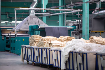 Knitted fabric. Textile factory in spinning production line and a rotating machinery and equipment production company.