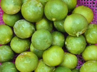 fresh green limes and lemons