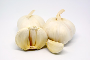 Fresh Garlic Bulbs and Clove Isolated on White Background