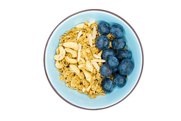 a bowl of cereal with blueberries