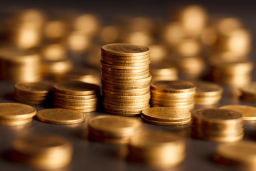 Stack of Gold Coin on Black Background.